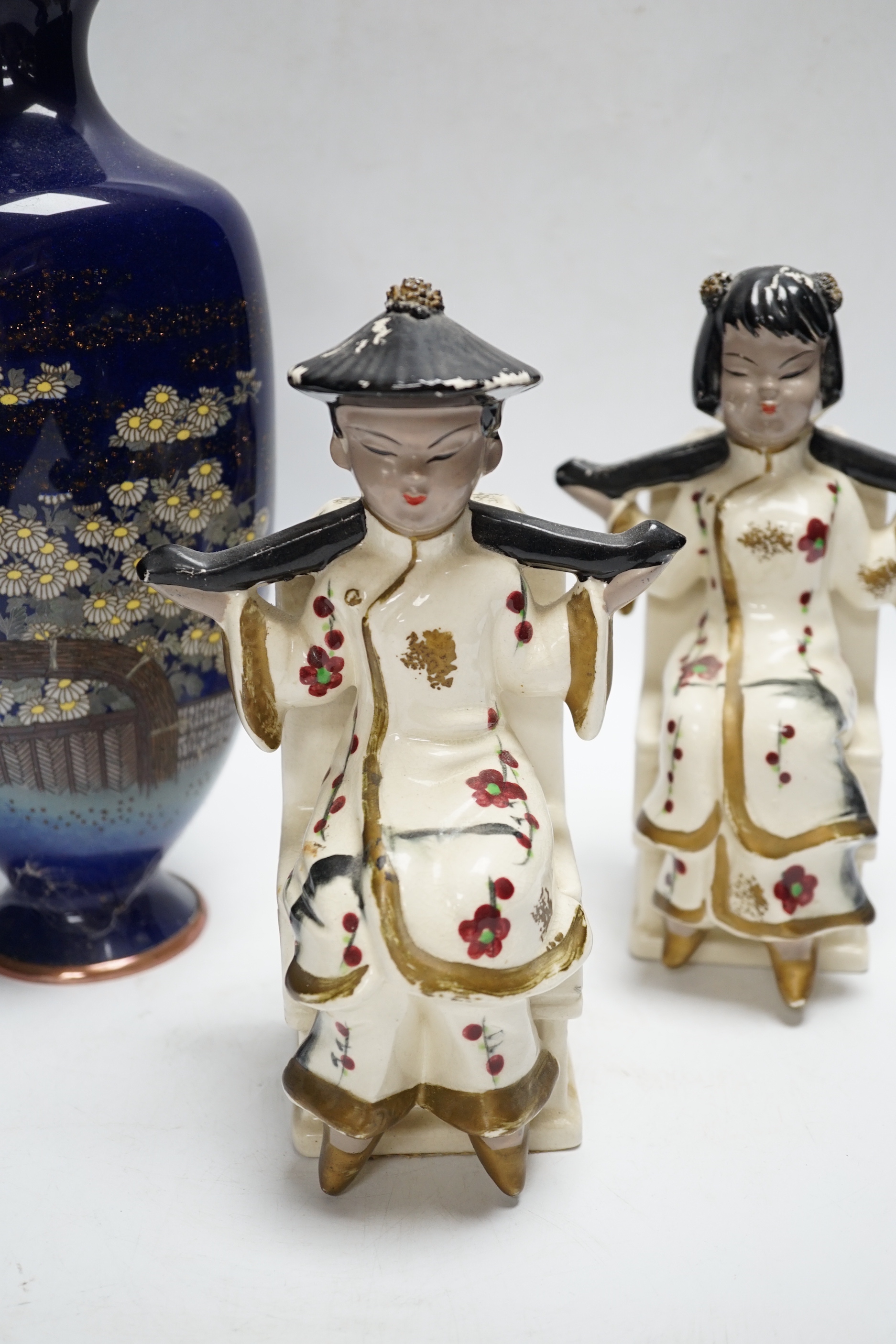 A pair of Japanese earthenware bookends and a Japanese cloisonné enamel vase, decorated in the musen and silver wire technique, vase 30cm